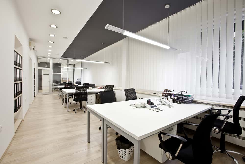 A compelted small office renovation project featuring a black and white colour scheme
